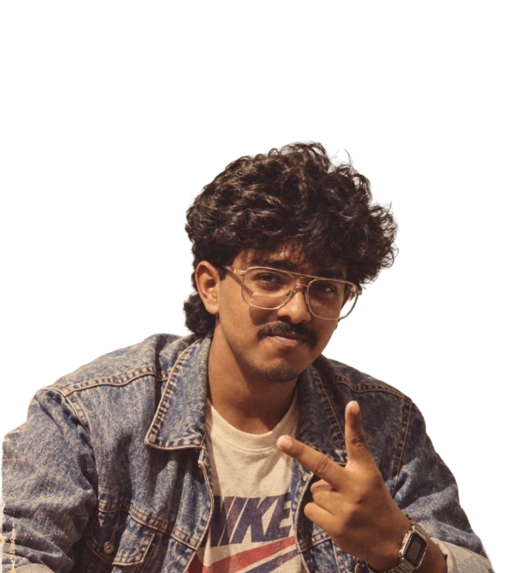 Amaze Saj wearing glasses and a denim jacket